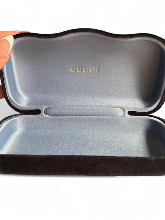 Gucci clamshell sunglasses case exterior black velvet and metallic blue interior